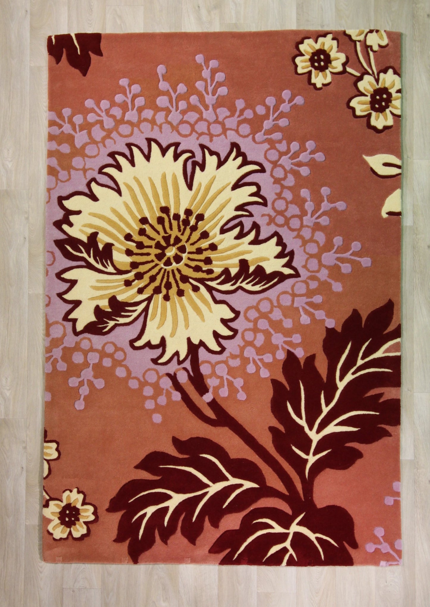 Tapis fleural en laine tuftée