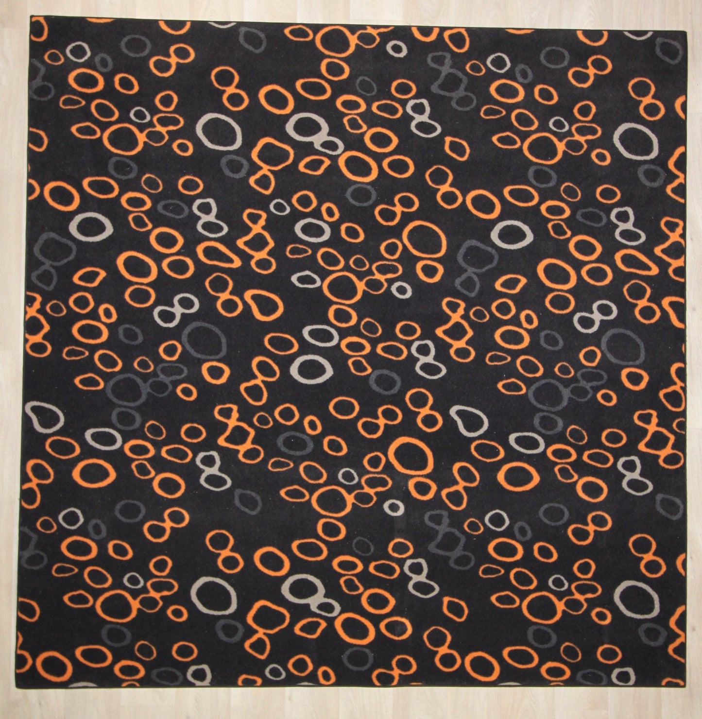 Tapis carré à motifs ronds