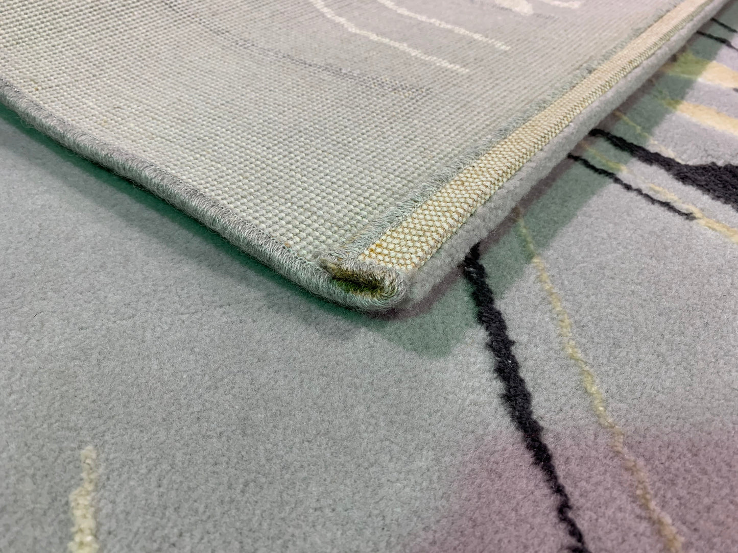 Tapis abstrait trois couleurs en laine