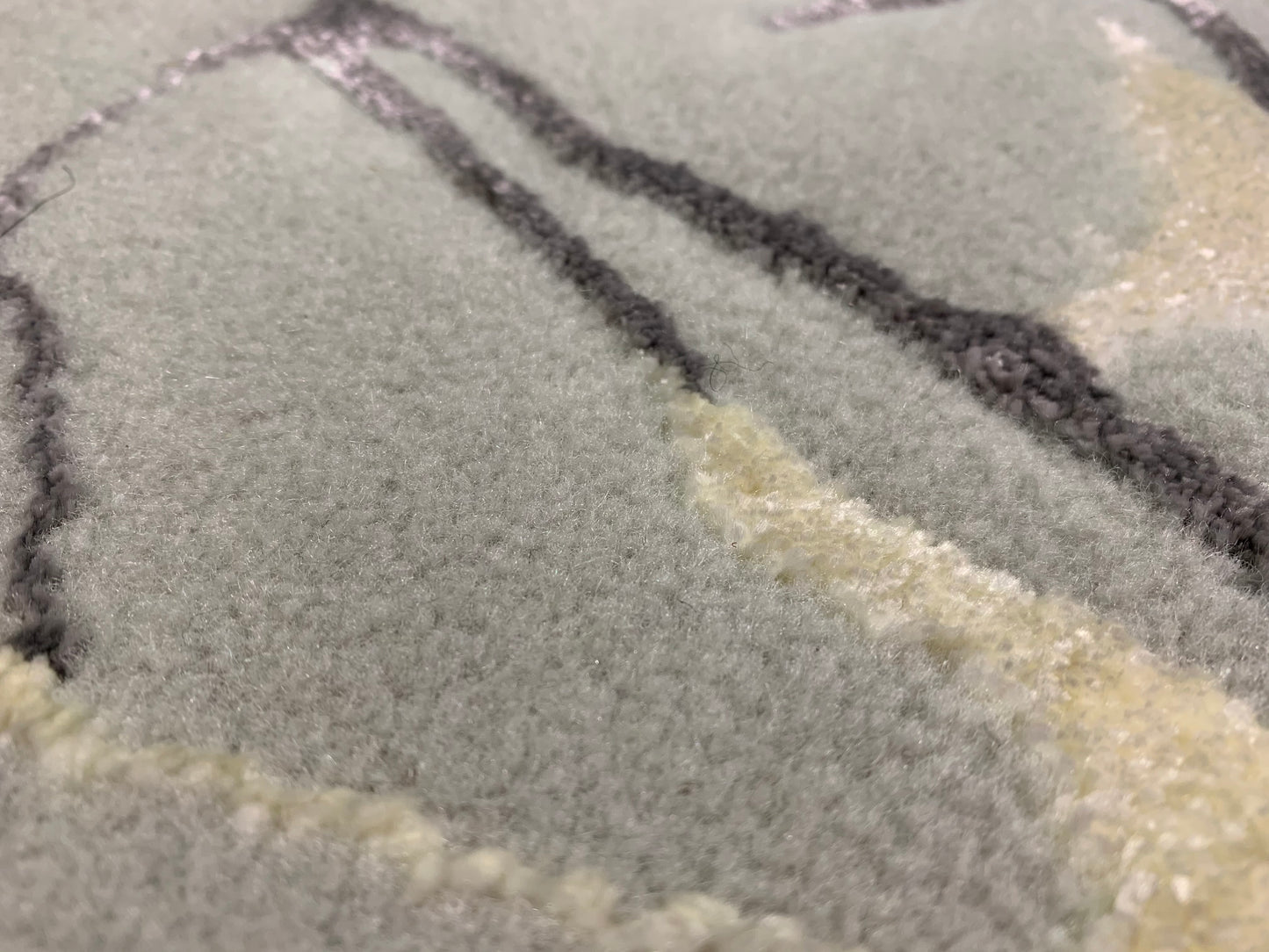 Tapis abstrait trois couleurs en laine