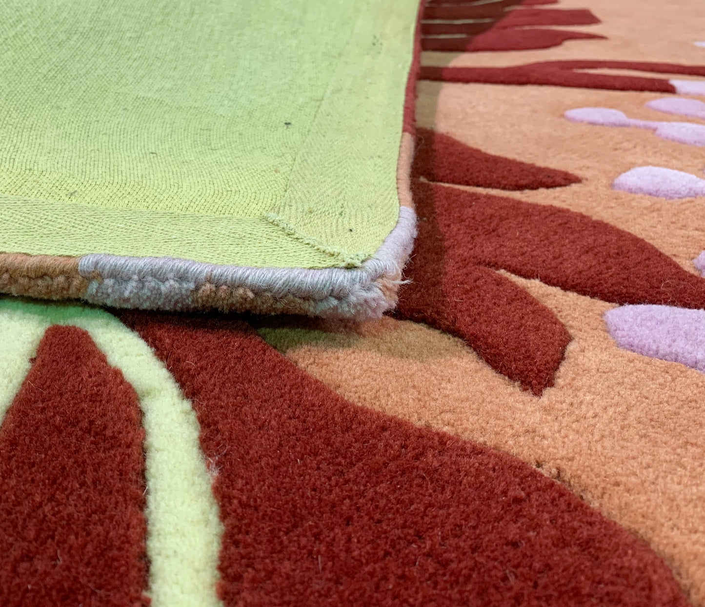 Tapis fleural en laine tuftée