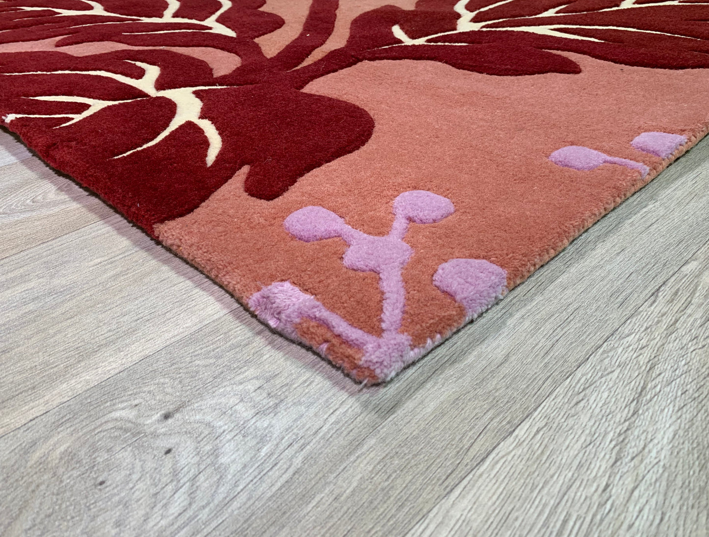 Tapis fleural en laine tuftée