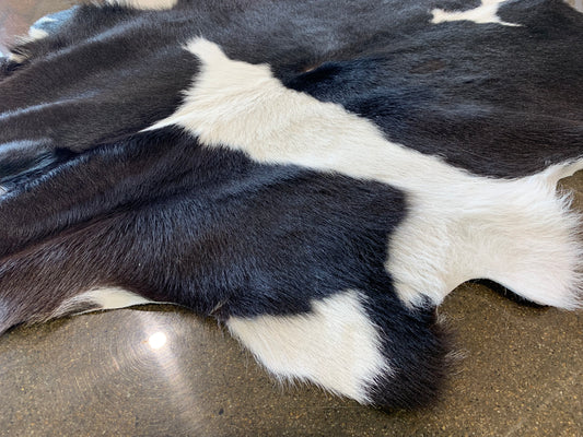 601-2: Cowhide rug - Very small black spotted